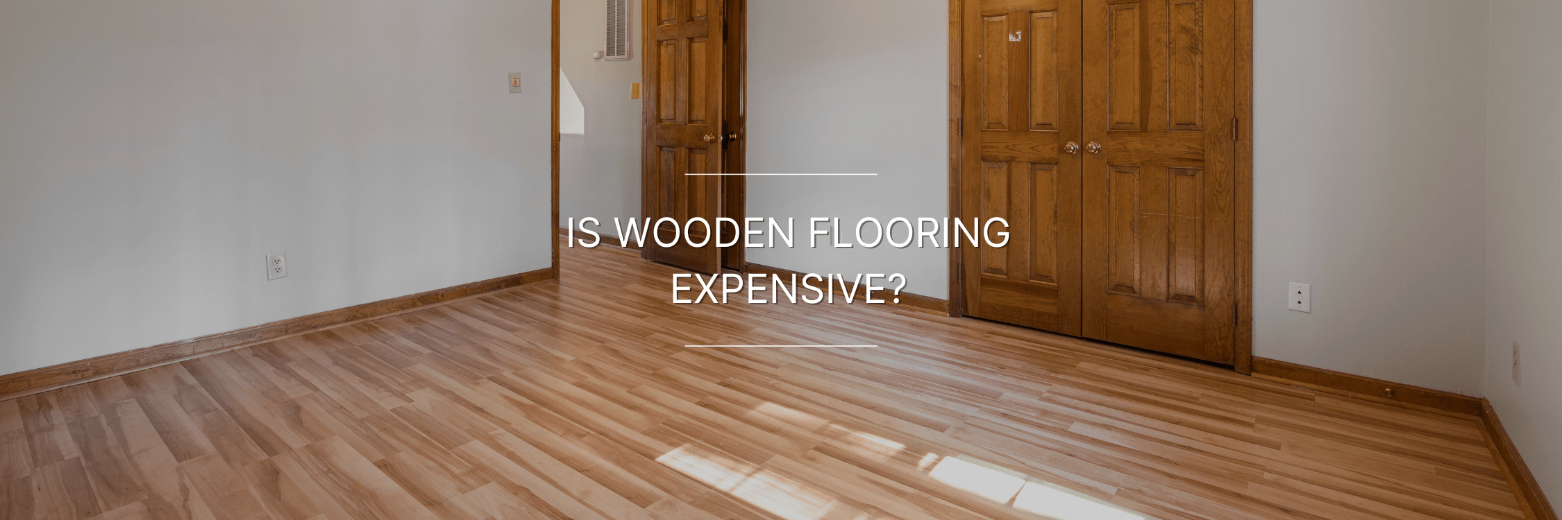 A bedroom with light brown wooden flooring, white walls, and wooden doors and the text written "Is wooden flooring expensive?"