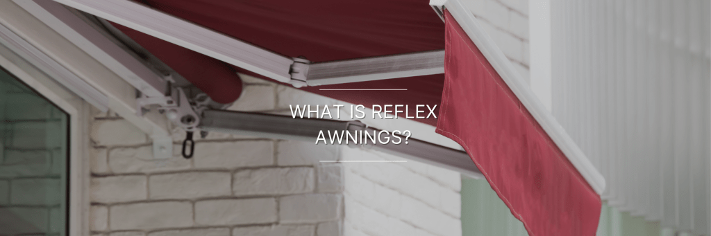 Red reflex awning attached to the side of a building