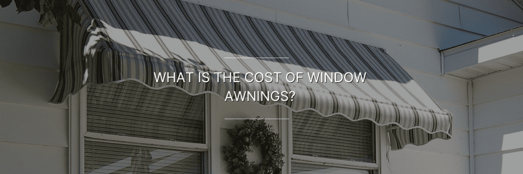 A striped fabric window awning provides shade over two windows of a house.