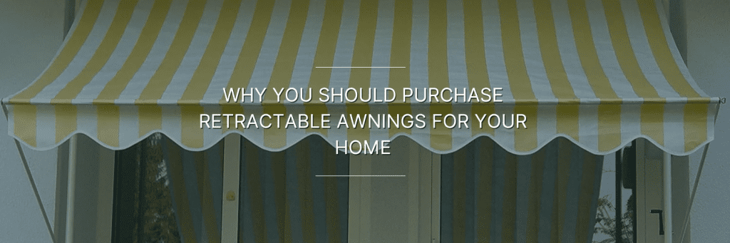 A striped fabric yellow and white window retractable awning over windows of a house.