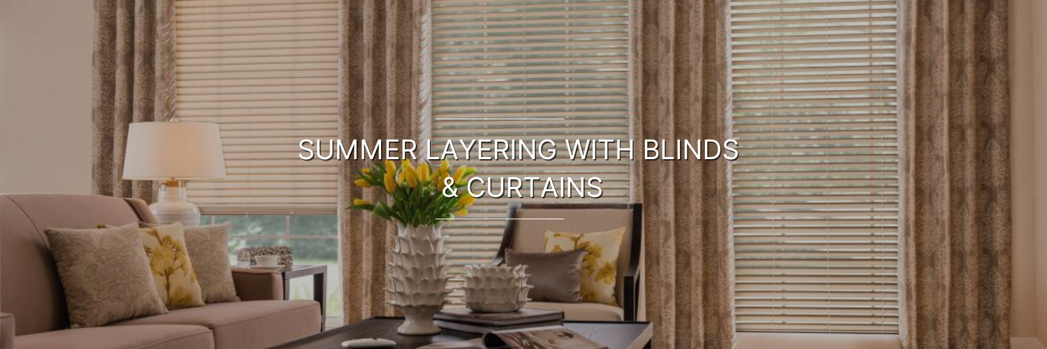 Cozy living room featuring elegant blinds and layered curtains, with floral decor and soft furnishings for a summer ambiance.
