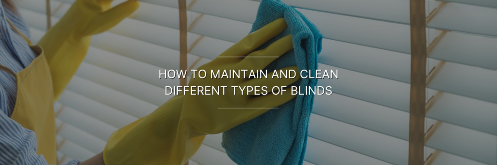 A person wearing yellow gloves cleans window blinds with a blue cloth