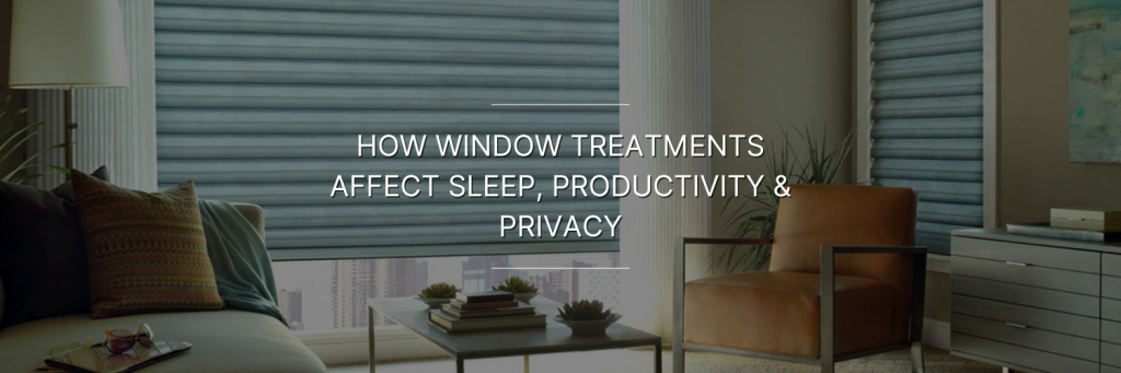 Stylish living room with blue window treatments, a cozy sofa, and a coffee table, highlighting the impact of window treatments on sleep and productivity.