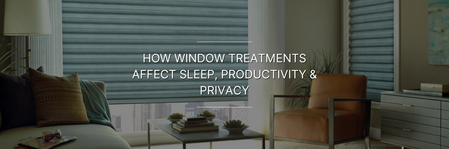 Stylish living room with blue window treatments, a cozy sofa, and a coffee table, highlighting the impact of window treatments on sleep and productivity.