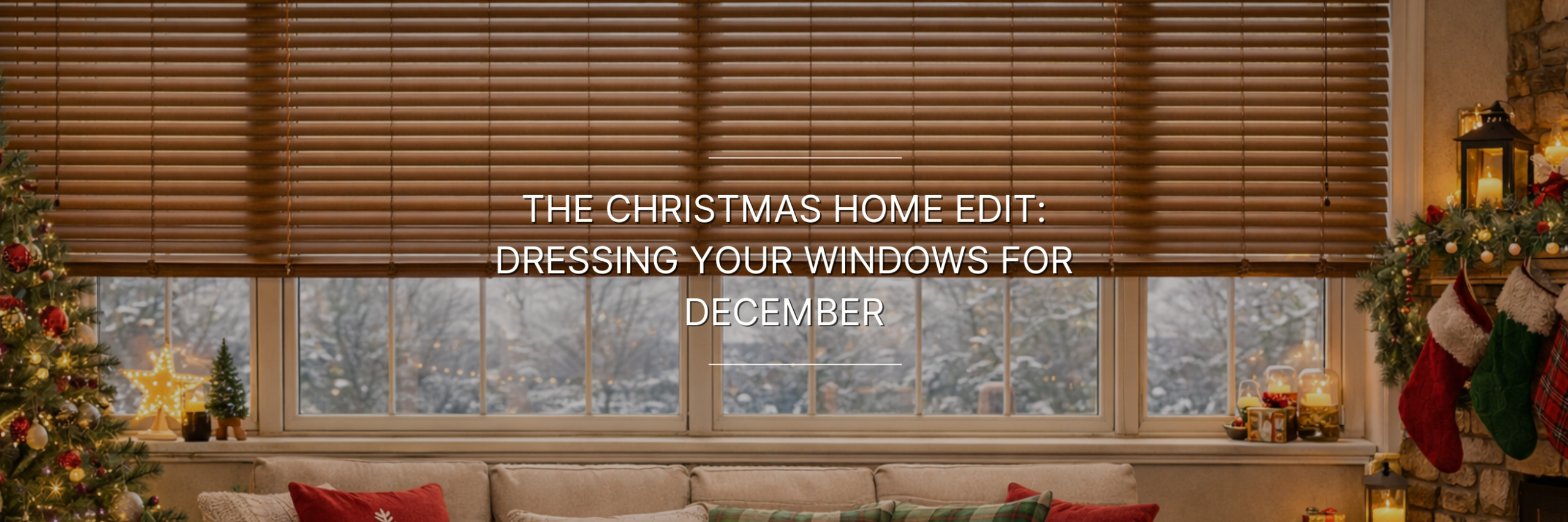 A cozy living room with a large window displaying a snowy view. Wooden blinds are partially down, and festive decor includes a Christmas tree and stockings.