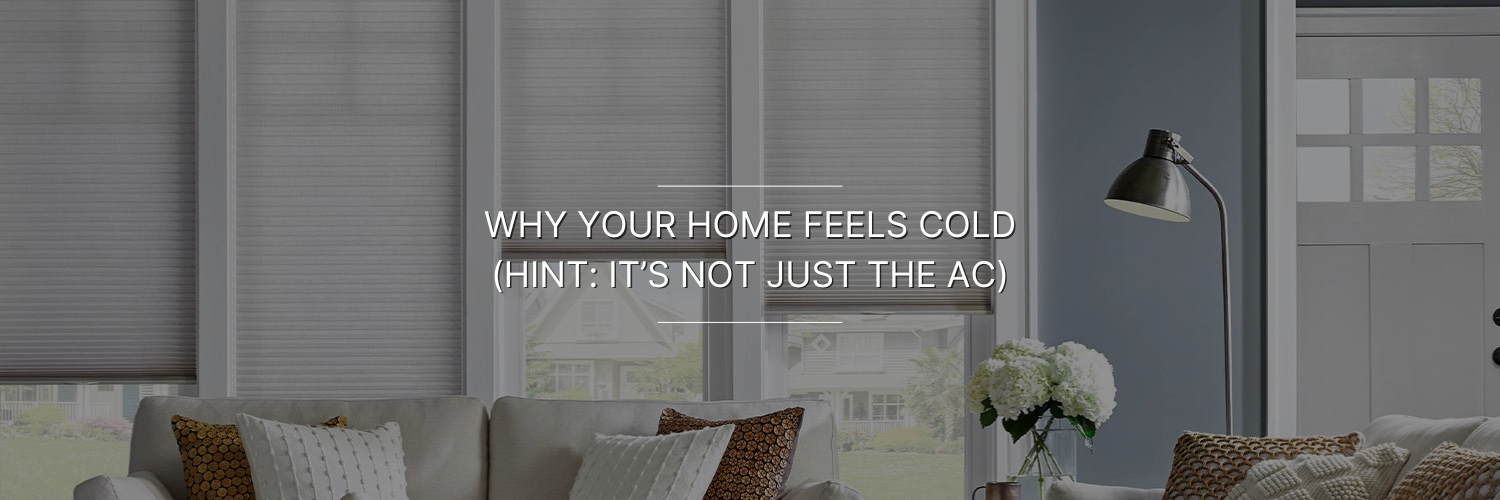 Cozy living room with blinds, decorative pillows, and a lamp, featuring a caption about why homes can feel cold beyond air conditioning.