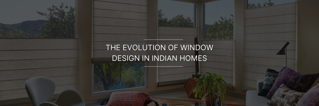 Modern windows in an Indian home, showcasing contemporary design with fabric shades and a glimpse of nature outside.