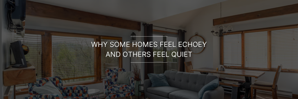 A cozy living room with wooden beams, grey sofa, patterned chairs, large windows with blinds, and a wooden dining table, text overlay: "Why some homes feel echoey and others feel quiet."
