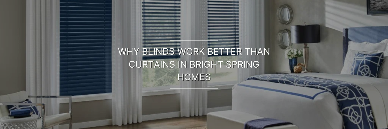 Modern bedroom with navy blue blinds, sheer white curtains, and blue-accented bedding promoting blinds over curtains in bright spring homes.