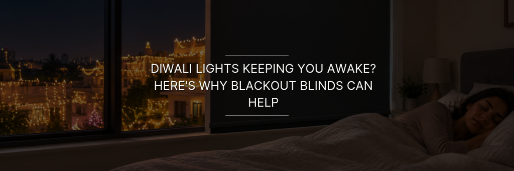 A woman sleeps peacefully in a cozy bedroom with blackout blinds drawn, while warm Diwali lights illuminate the buildings outside the window at night.